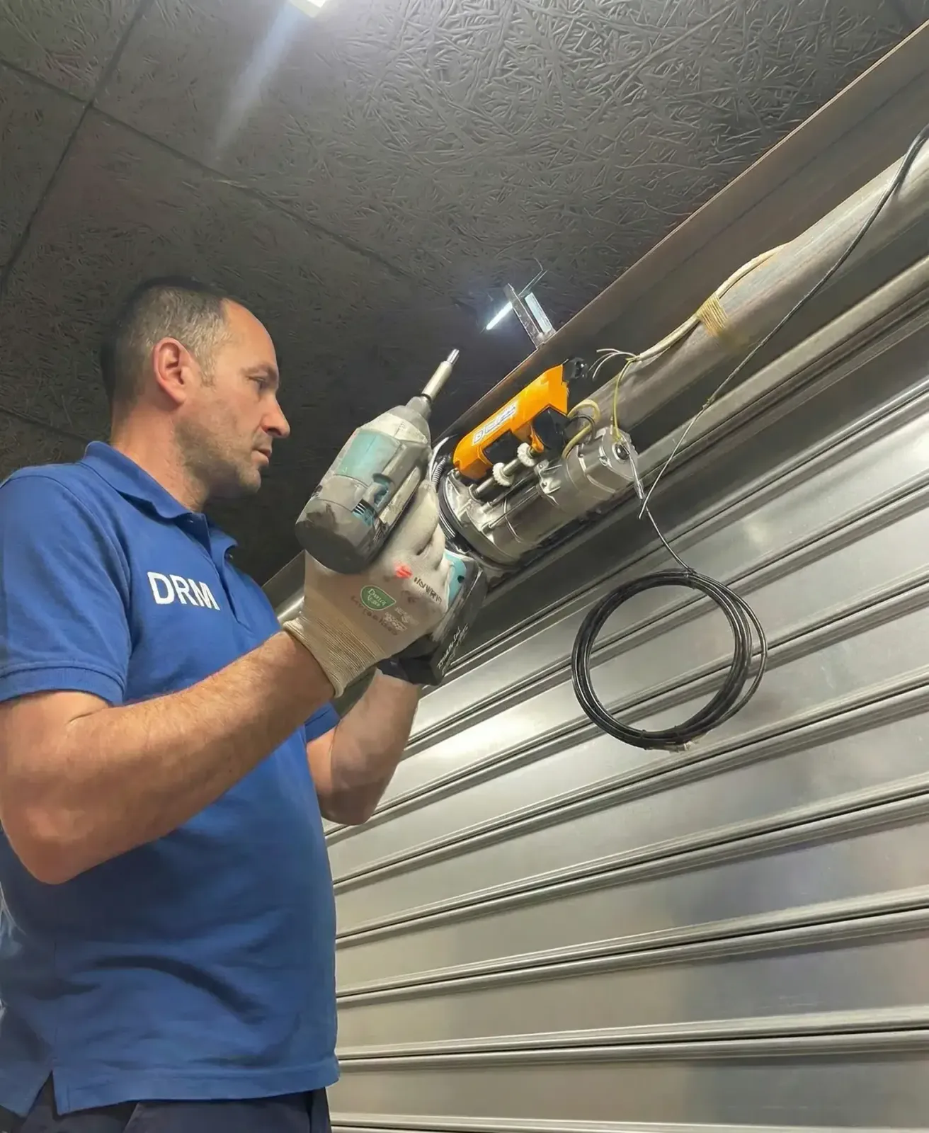 Motorisation de rideau métallique à Dijon